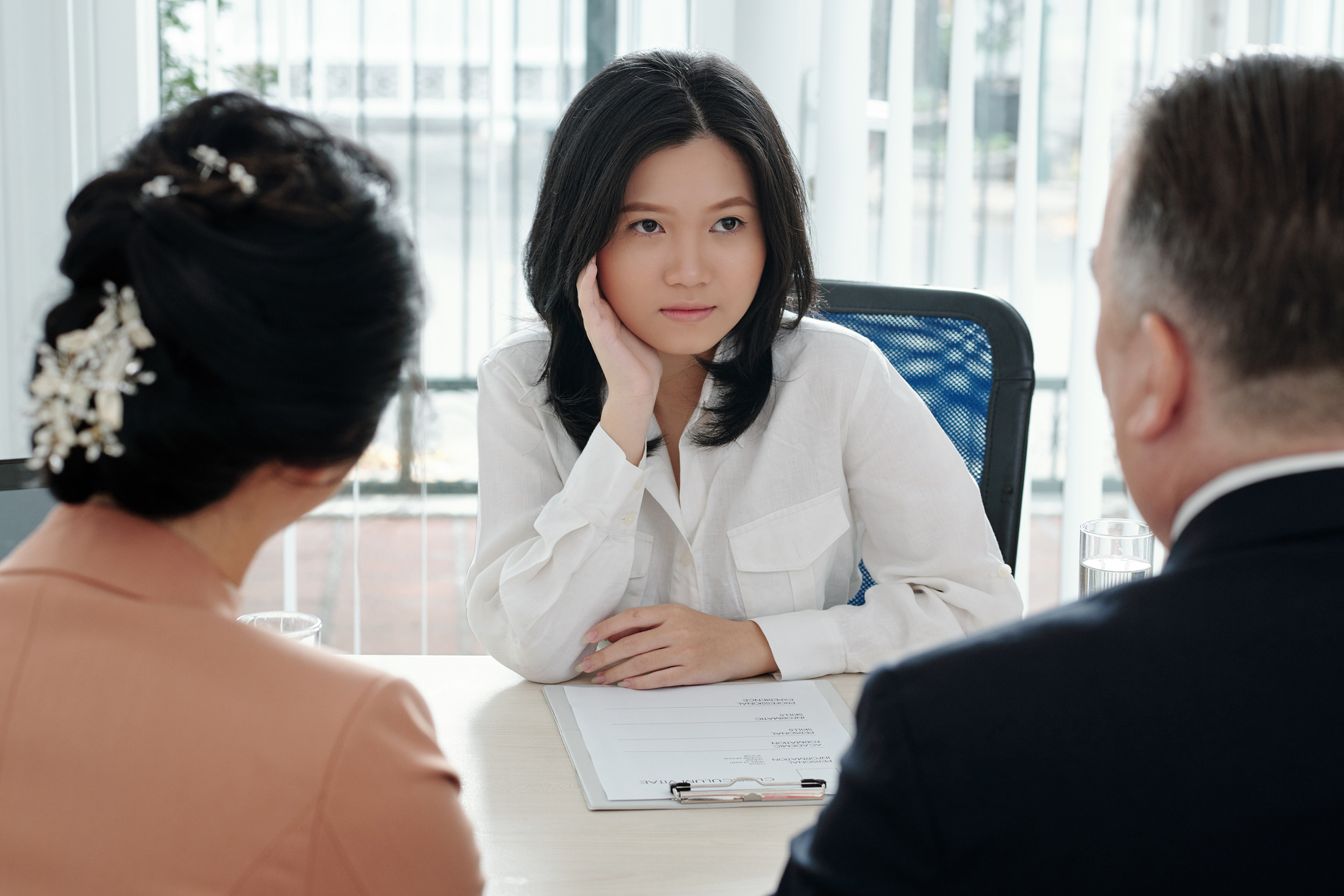 Women being interviewed by her workplace mentors