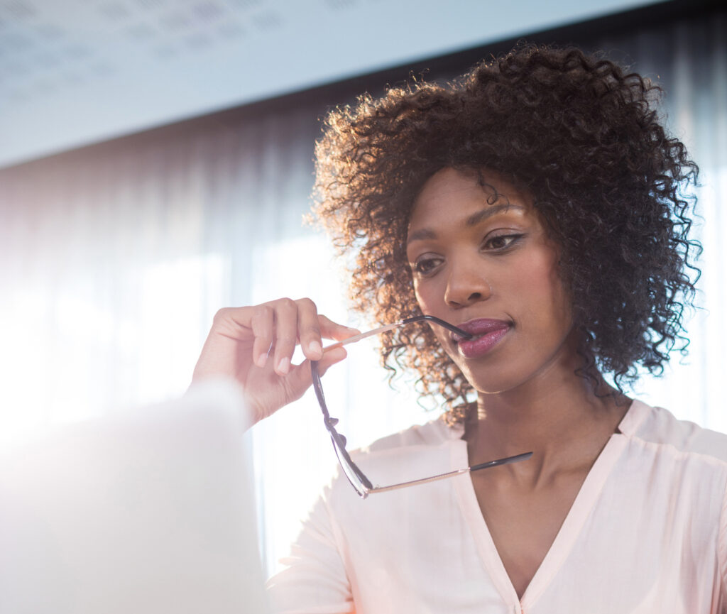 Businesswoman working on her computer at office