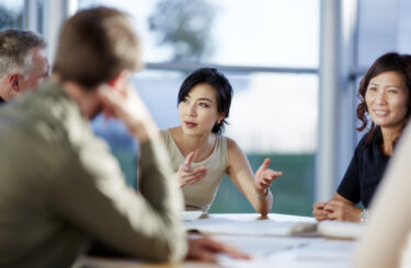 Business people talking in meeting