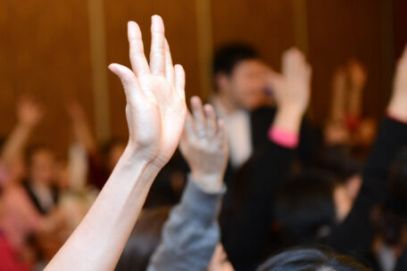 Raising your hand to learn to speak up