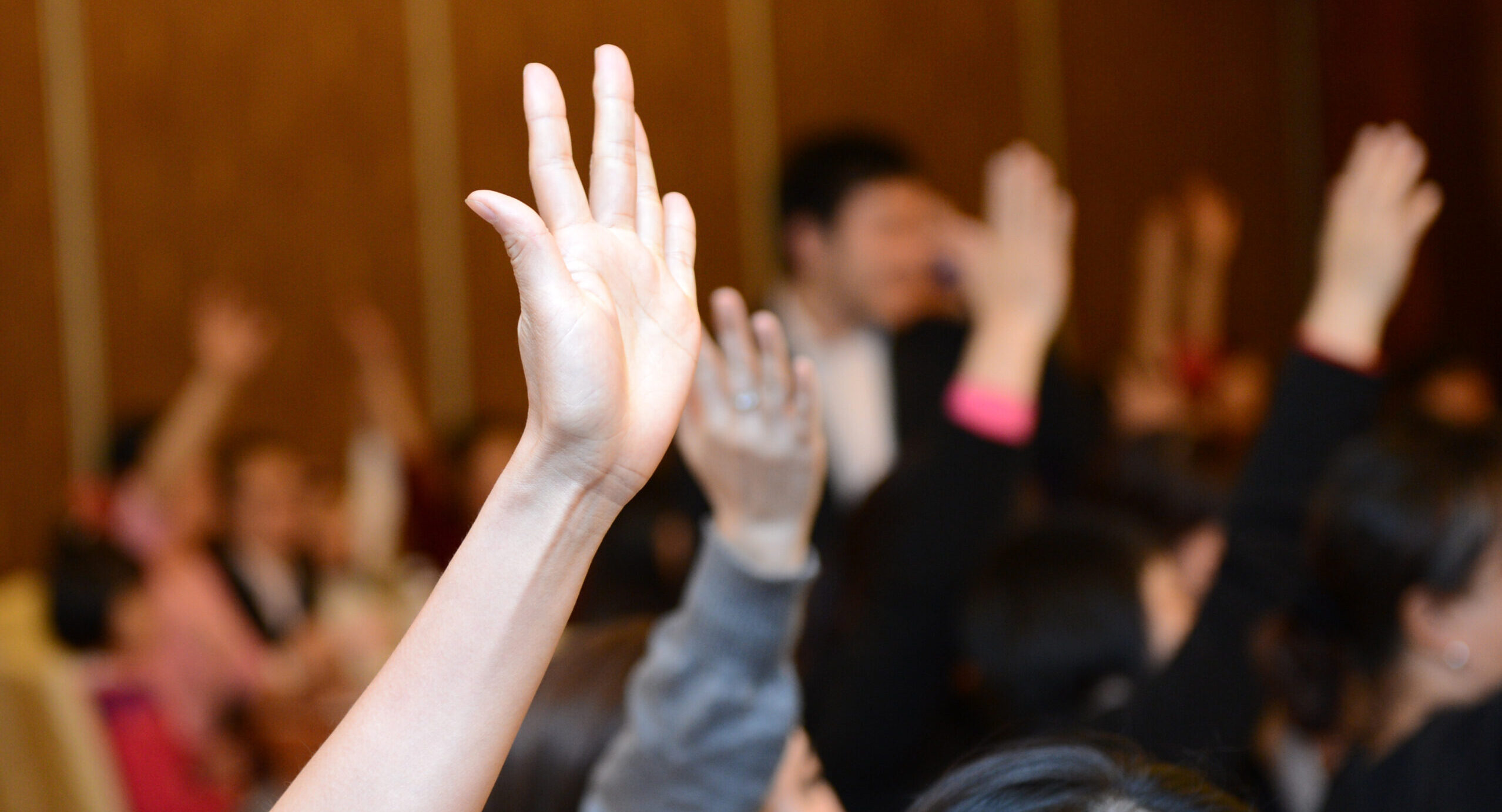 Raising your hand to learn to speak up